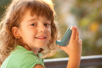 Girl with asthma inhaler